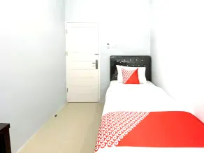Hotel O Guesthouse Pagi Sore Syariah - Zimmer