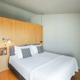 Baumhaus Serviced Living - Art & Design Apartments - Chambre