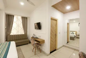 Hotel Emerald Suites By Aura - Chambre