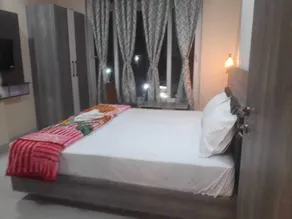 LS Grand Guest House - Chambre
