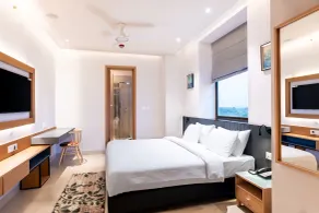 Krishna's courtyard Hotel & Convention - Værelse