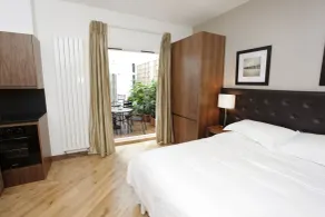 Presidential Serviced Apartments Kensington - Chambre