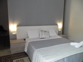 Le vie del Centro - Room