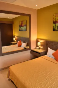 NP Hotel & Suites - Room