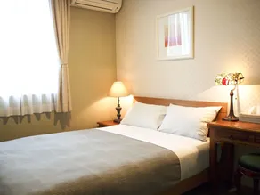 Aso Base Backpackers - Chambre