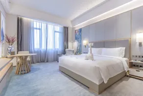 Qianhuazhou Hotel - Værelse