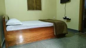 Nest Guest House - Chambre