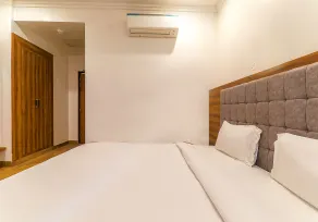Fabexpress Global Inn New - Room