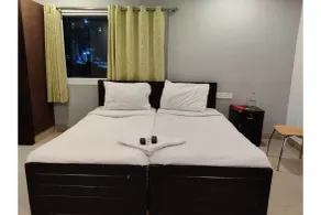 Capital O 44354 Jubilee Banjara Suites - Quarto