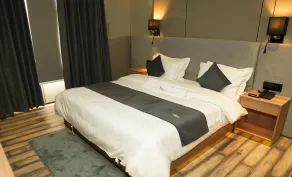 Hotel Aroma Inn - Chambre