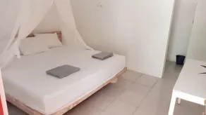 THE VILLAGE INN Rua Beach  - Chambre