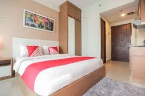 OYO Flagship 755 Appartel Grand Dhika City - Room