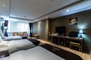 Weihai Huakun Hotel - Zimmer