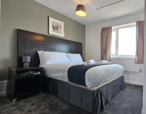 The Strand Hotel - Chambre
