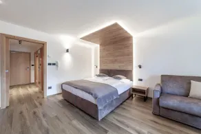 Aparthotel Familiaris - Family Apartments - Pools & Spa in Dolomites - Chambre