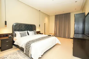 Taj Al Munira Serviced Apartments - Værelse