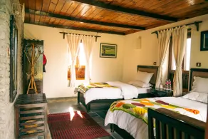 Mountain Lodges of Nepal - Tomijong - Room