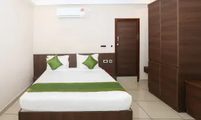 Treebo Durga Boji Grand, Gonikoppal Town - Zimmer