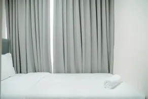 2BR Deluxe and Modern Menteng Park Apartment By Travelio - Room
