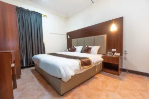 Al Eairy Serviced Apartments Company is a one-person company 4 - Chambre