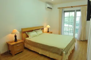 Coco Flower Village Serviced Apartment - Quarto