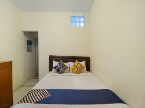 Golf Papa Costel by OYO Rooms - Chambre