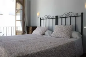 Apartamentos La Ciudad - Zimmer