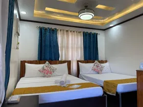 Aquilah Homestay Inn - Chambre