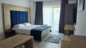 M City Aparthotel - Zimmer