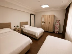 Lumiera Suites Hotel - Habitación