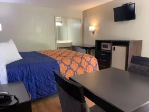 Relax Inn & Suites - Chambre