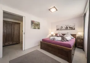 Attraente appartamento accogliente e familiare con sauna, idromassaggio e piscina | Vista sulla montagna | Accetta animali domestici - Camera
