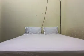 Hotel O Kost Naura - Habitación
