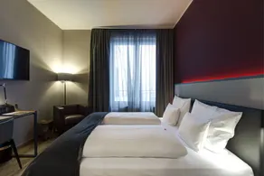 Qube Hotel Bahnstadt - Room