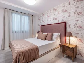 Apartamentos Puerta Elvira Suites 3000 - Værelse