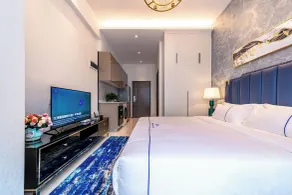 Huaqiang North Executive Apartment - Pokój