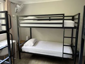 Homely Inn Hostel - Zimmer