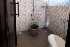 Hotel O Guest House Bu Iin Syariah - Badezimmer