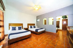 Capital O Hotel Casa Blanca - Chambre