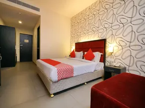 Capital O 15754 Mookkannoor Tourist Home - Chambre