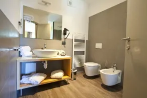 Harmony Suite Hotel - Badezimmer