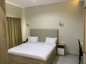 Greywood Hotel and Apartments - Habitación