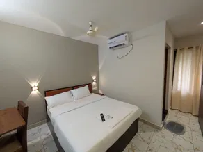 Hotel Vista by Booksy One Kollam Near Kollam Bypass - Room