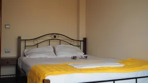 Armonia Apartments - Chambre