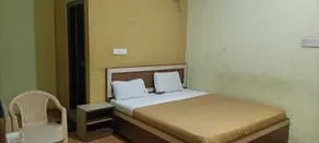 iROOMZ Hotel Vishwa Lodging - Zimmer