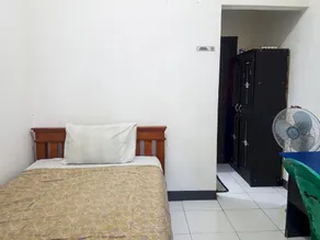SPOT ON 93997 Sutangkas Kost - Chambre