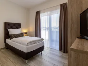 GLEUEL INN HOTEL - Serviced Apartments - Room