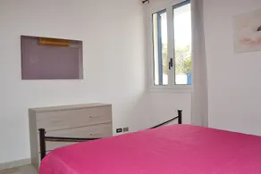 Casa vacanze a San Foca con dehors arredato e zone relax sul retro e sul davanti - Camera