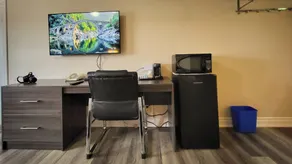 Maple Leaf Inn & Suites - Chambre