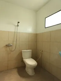 Richmond Guest House Cirebon RedPartner - Badezimmer